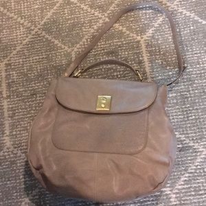 Dove grey leather handbag with brass hardware